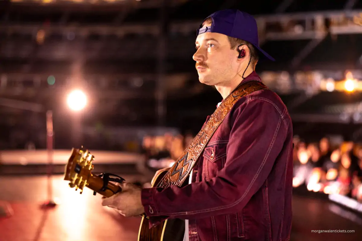 Morgan with guitar on stage