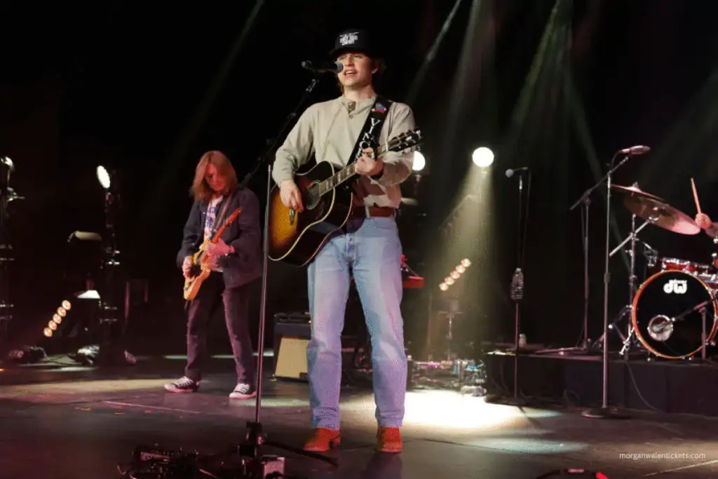 Vincent Mason on stage with guitar